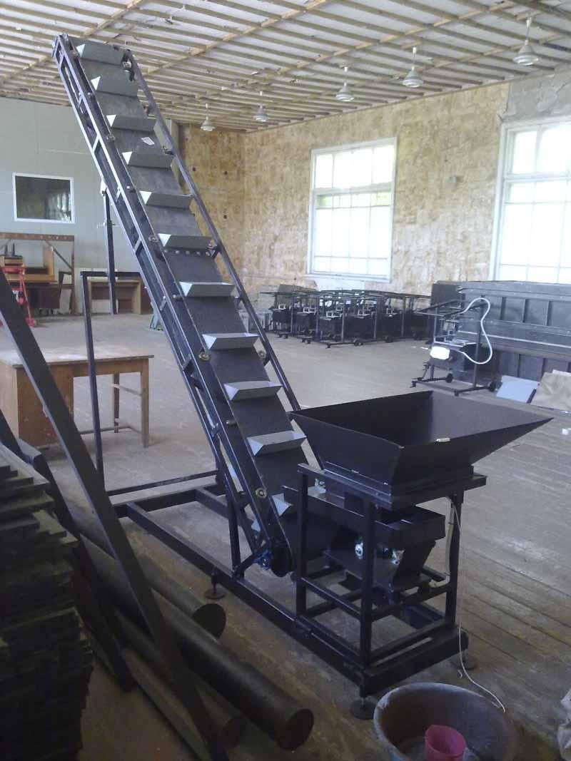 Транспортер ковшовый скребковый